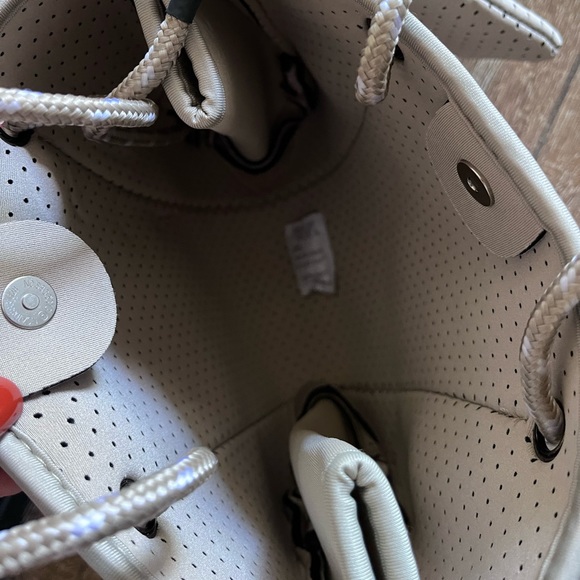 NWOT ah•dorned Neoprene perforated shoulder tan bag - Picture 7 of 16